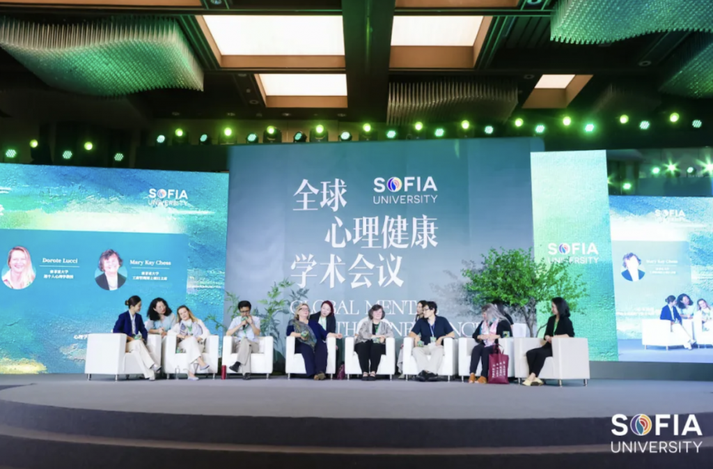 people seated on stage