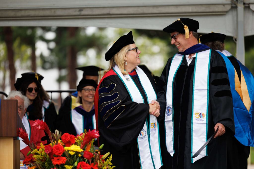 Gordan's Graduation, shaking hands on stage