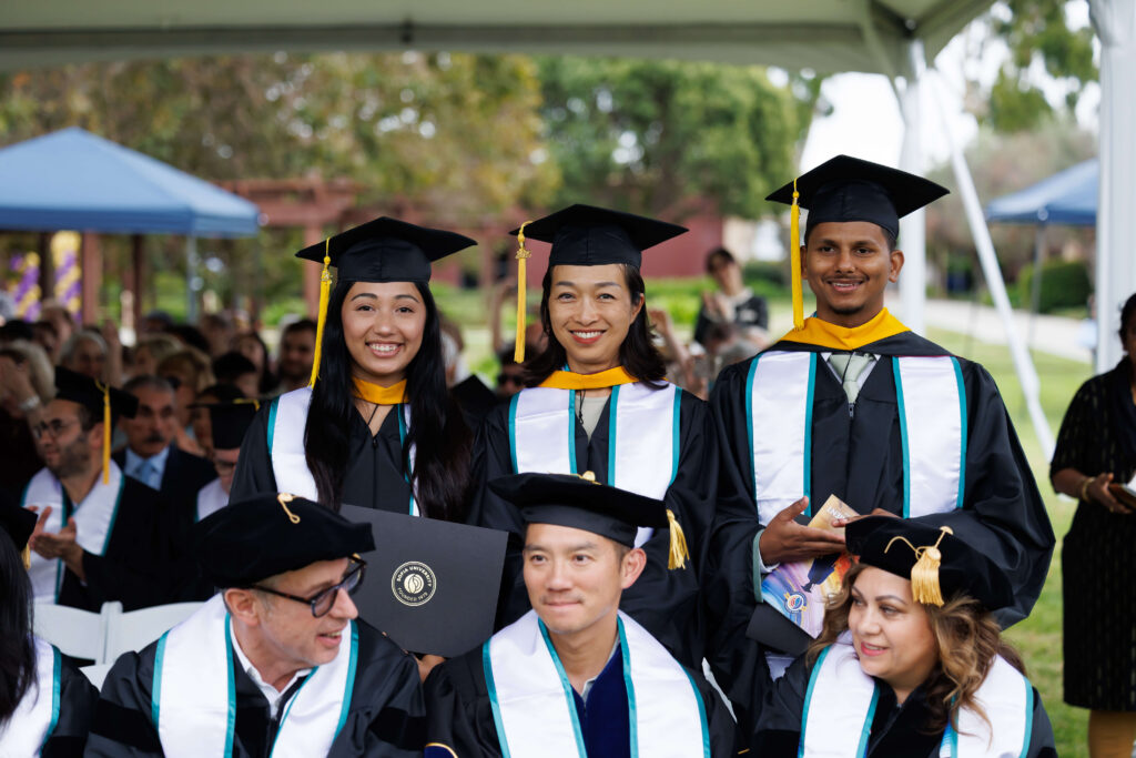 group of graduates in their caps and gowns