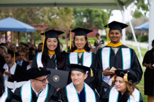 group of graduates in their caps and gowns