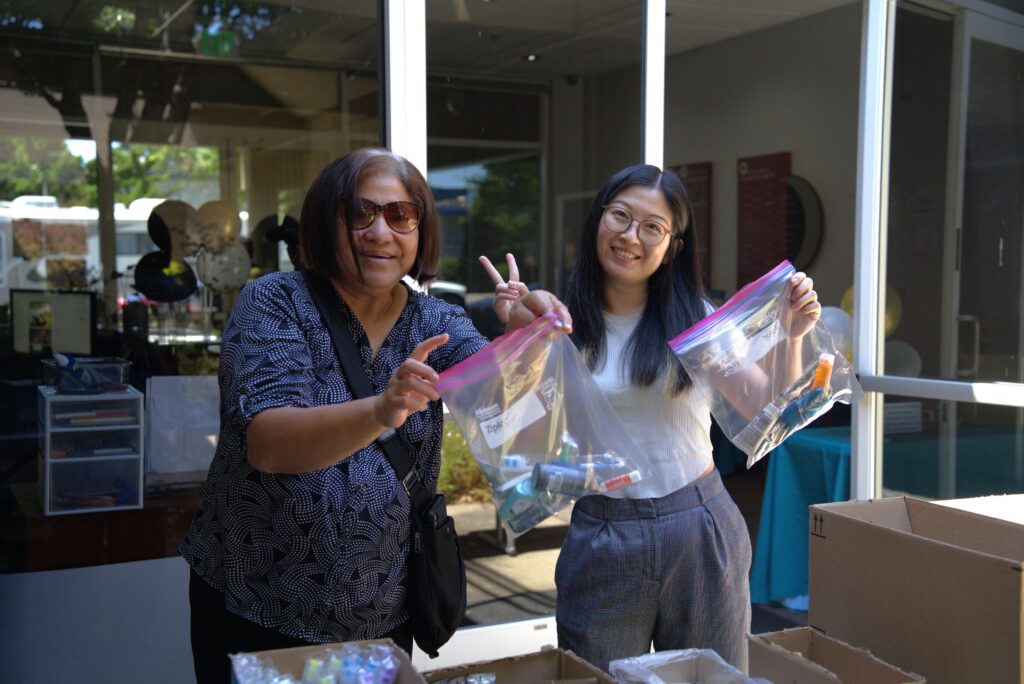 2 women volunteering at the On-Campus Service & Stewardship Event at Sofia University