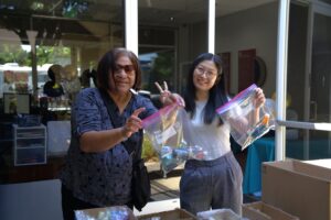 2 women volunteering at the On-Campus Service & Stewardship Event at Sofia University