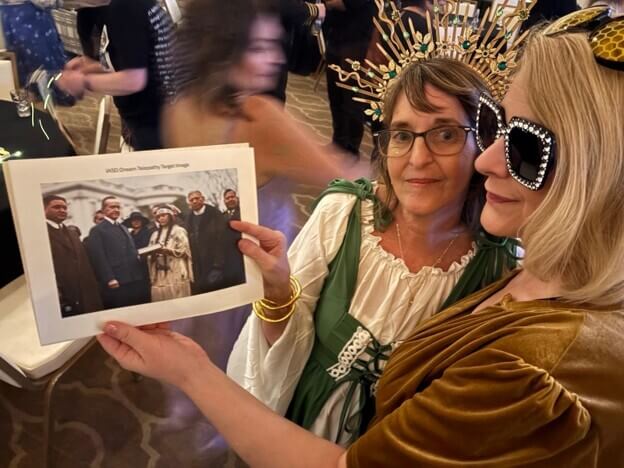 IASD Board Chair, Sherry Puricelli shares the IASD Dream Telepathy Contest Target Image with Dr. Morgan.