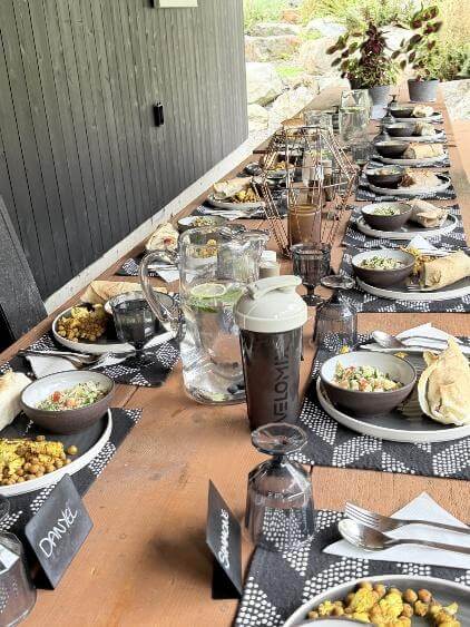 A long table with plates of food