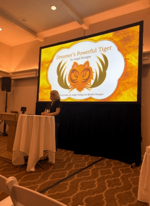 Dr. Morgan introducing Dreamer’s Powerful Tiger at IASD 2026.